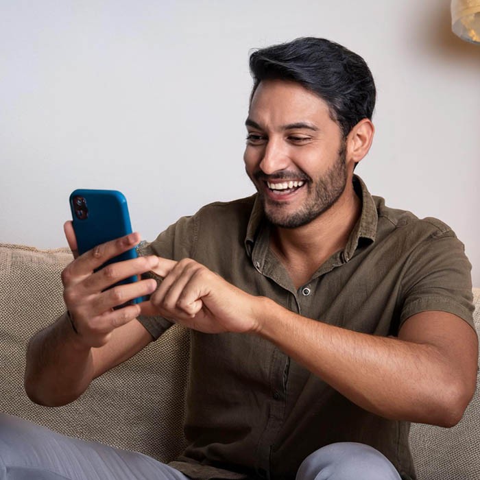 Person bidding in an online auction from their living room